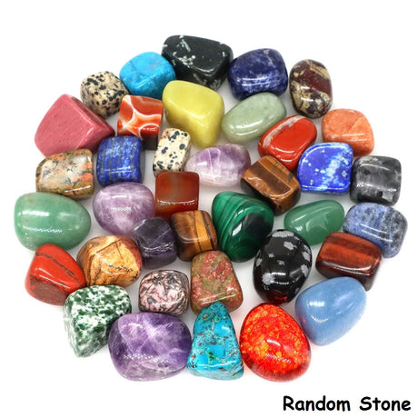 Assorted colorful stones on a white background
