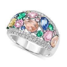 Multicolored gemstone ring with a white gold band on a white background