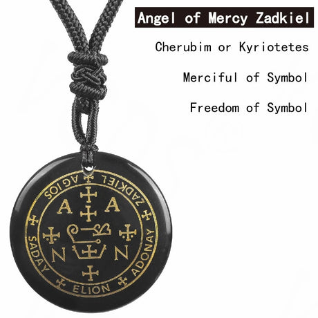 Black pendant with gold symbols and text on a white background