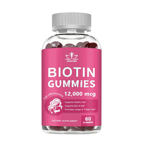 Bottle of biotin gummies with a pink label on a white background