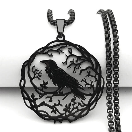 Black pendant with a crow design on a white background