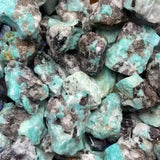 Turquoise-colored rocks with brownish tones