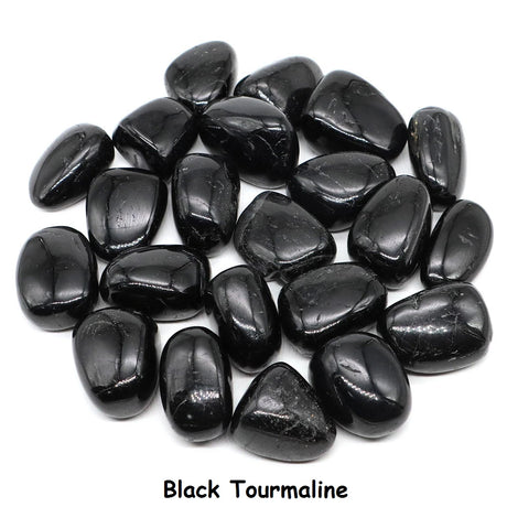 Black Tourmaline stones on a white background.