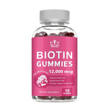 Bottle of biotin gummies with a pink label on a white background