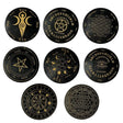 Set of black and gold circular designs with various symbols on a white background