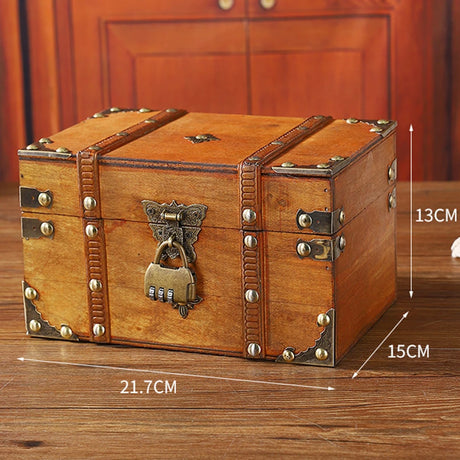 Wooden treasure chest with lock on a wooden surface, with measurements indicated.