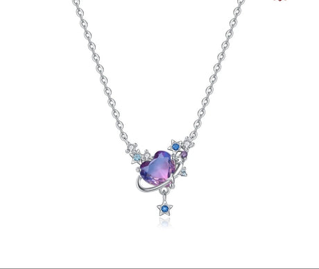 Silver necklace with a heart-shaped purple gem and star pendant on a white background, featuring Orstarry branding.
