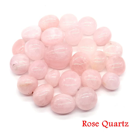 Pink rose quartz stones on a white background with 'Rose Quartz' text.