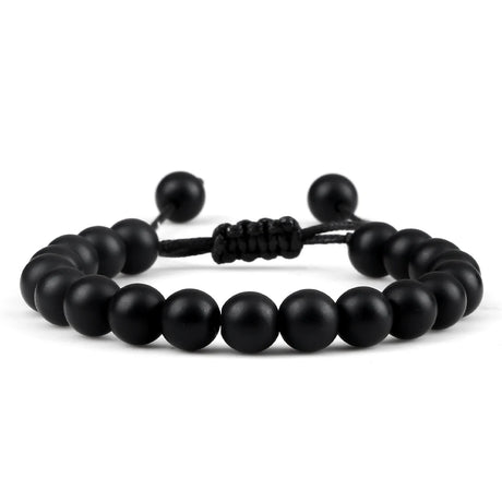 Black beaded bracelet on a white background