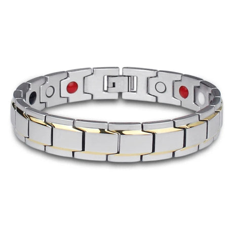 Silver and gold bracelet with red stones on a white background