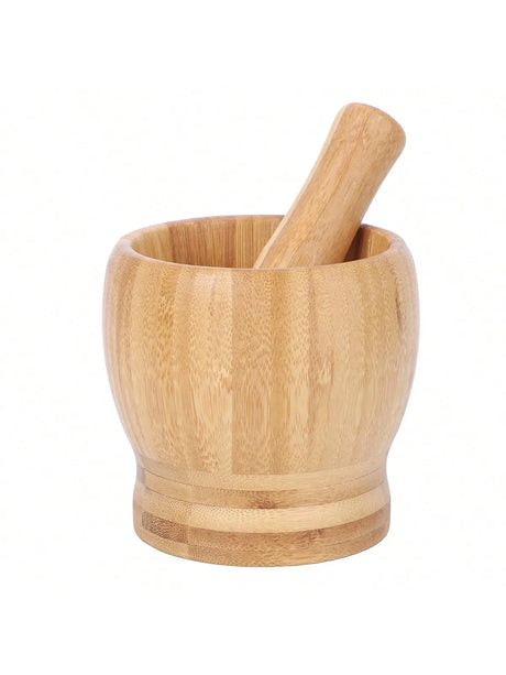 Wooden mortar and pestle on a white background