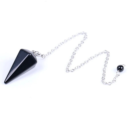 Black pyramid-shaped pendant on a silver chain with a small black bead on a white background.