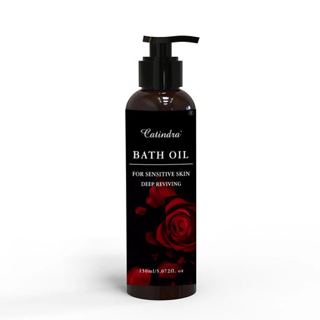 Bath oil bottle with red rose design on a white background