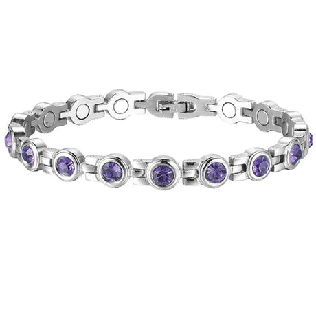 Silver bracelet with purple gemstones on a white background