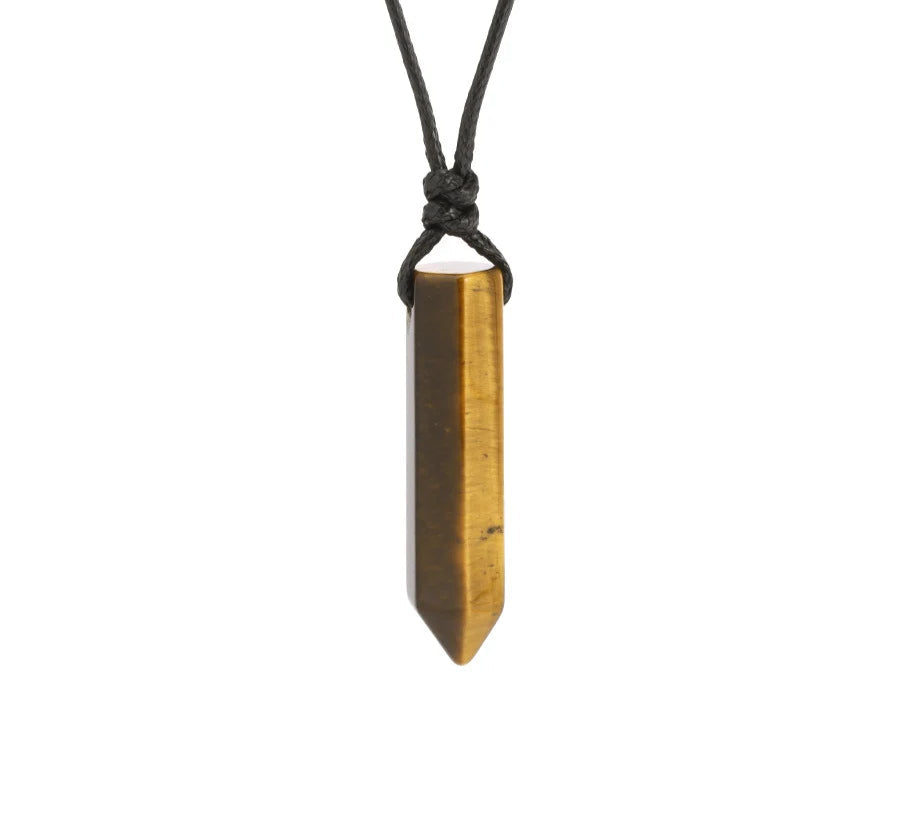 Tiger eye crystal pendant on a black cord against a white background