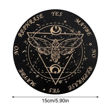 Black circular coaster with white symbols and text, featuring a moth design, on a white background.