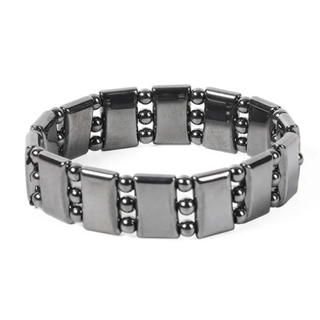 Silver bracelet with square links and beads on a white background