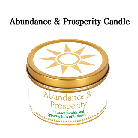 Abundance & Prosperity candle with gold lid and white label on a white background