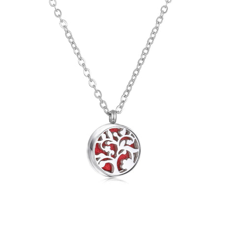 Silver necklace with a round pendant featuring a tree design on a white background