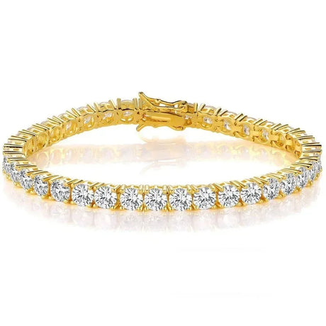 Gold bracelet with clear gemstones on a white background