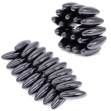 Two stacks of metallic, bullet-shaped objects on a white background
