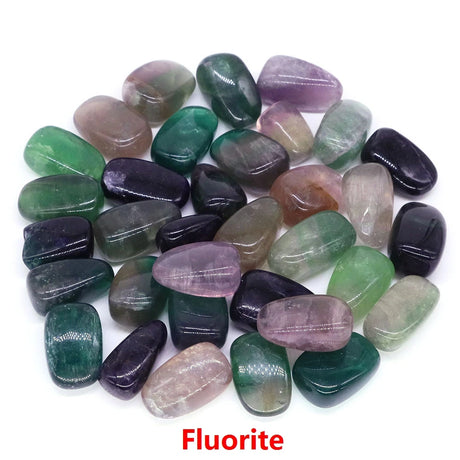 Collection of fluorite stones in various colors on a white background