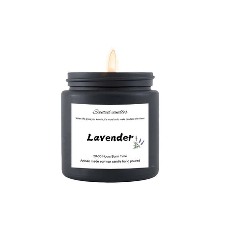 Black candle with a white label on a white background