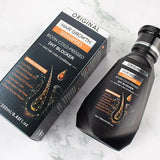 Hair growth shampoo bottle and packaging on a marble surface