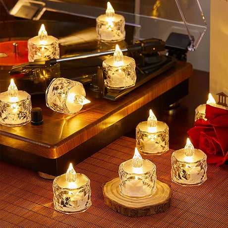 Decorative candles on a wooden surface with a warm glow