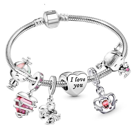 Silver bracelet with various charms including hearts and animals on a white background