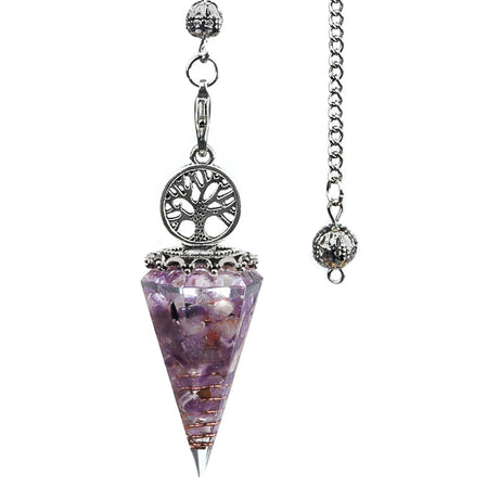 Crystal pendulum with tree of life design on a white background