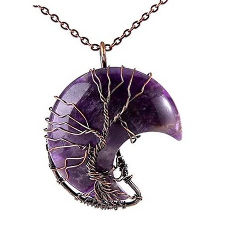 Purple crescent moon pendant with tree design on a white background