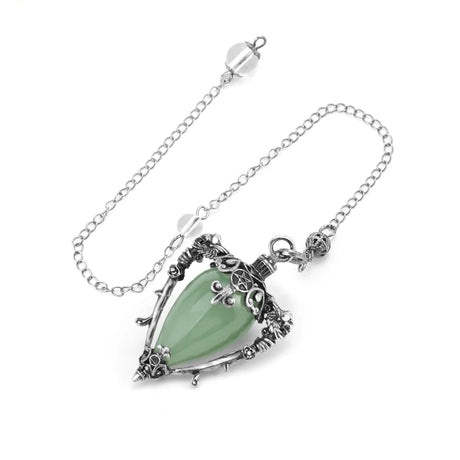 Necklace with a green pendant and silver chain on a white background