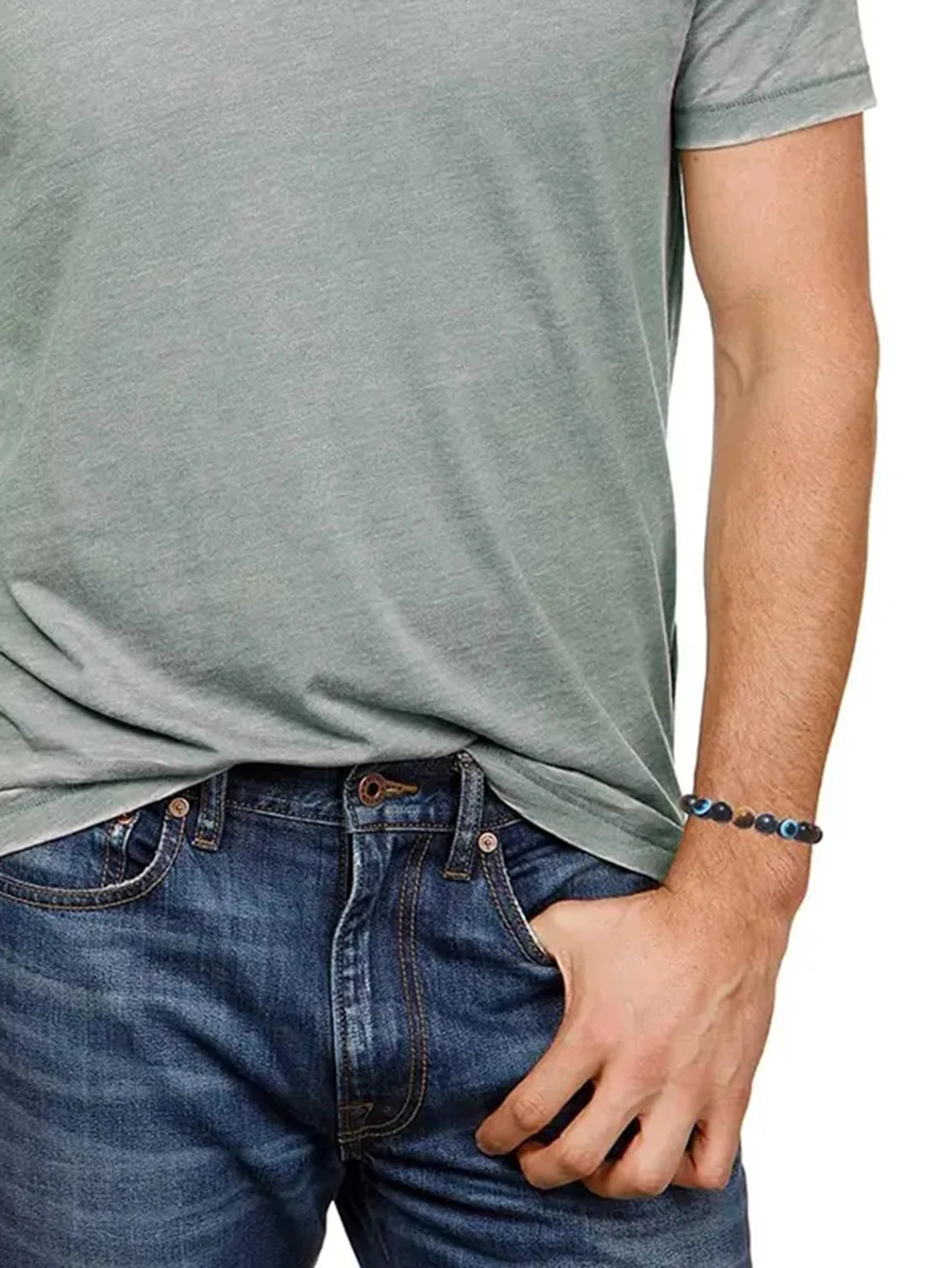 Person wearing a gray t-shirt and blue jeans with a white background