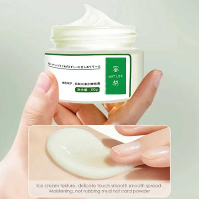 Hand holding a jar of cream with a close-up of the cream's texture on a light gray background