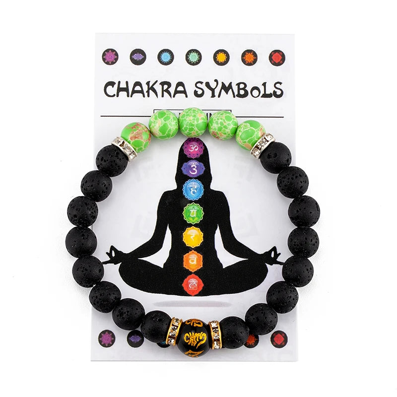 Black beaded bracelet with colorful chakra symbols on a white background