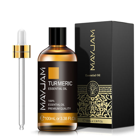 Mayuam Turmeric Essential Oil bottle with dropper and packaging on a white background