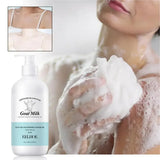 Bottle of goat milk shower gel with a person applying it to their skin.