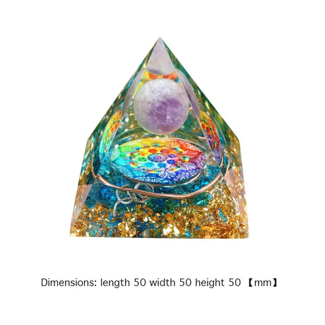 Pyramid-shaped object with colorful interior and gemstone on a white background