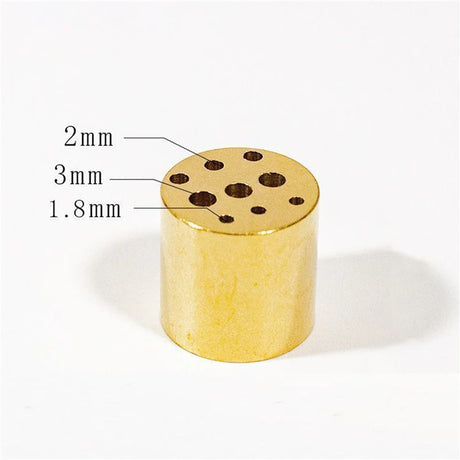 Gold cylindrical object with labeled holes of different diameters on a white background