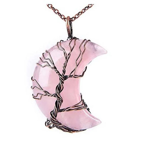 Pink crescent moon pendant with tree design on a white background
