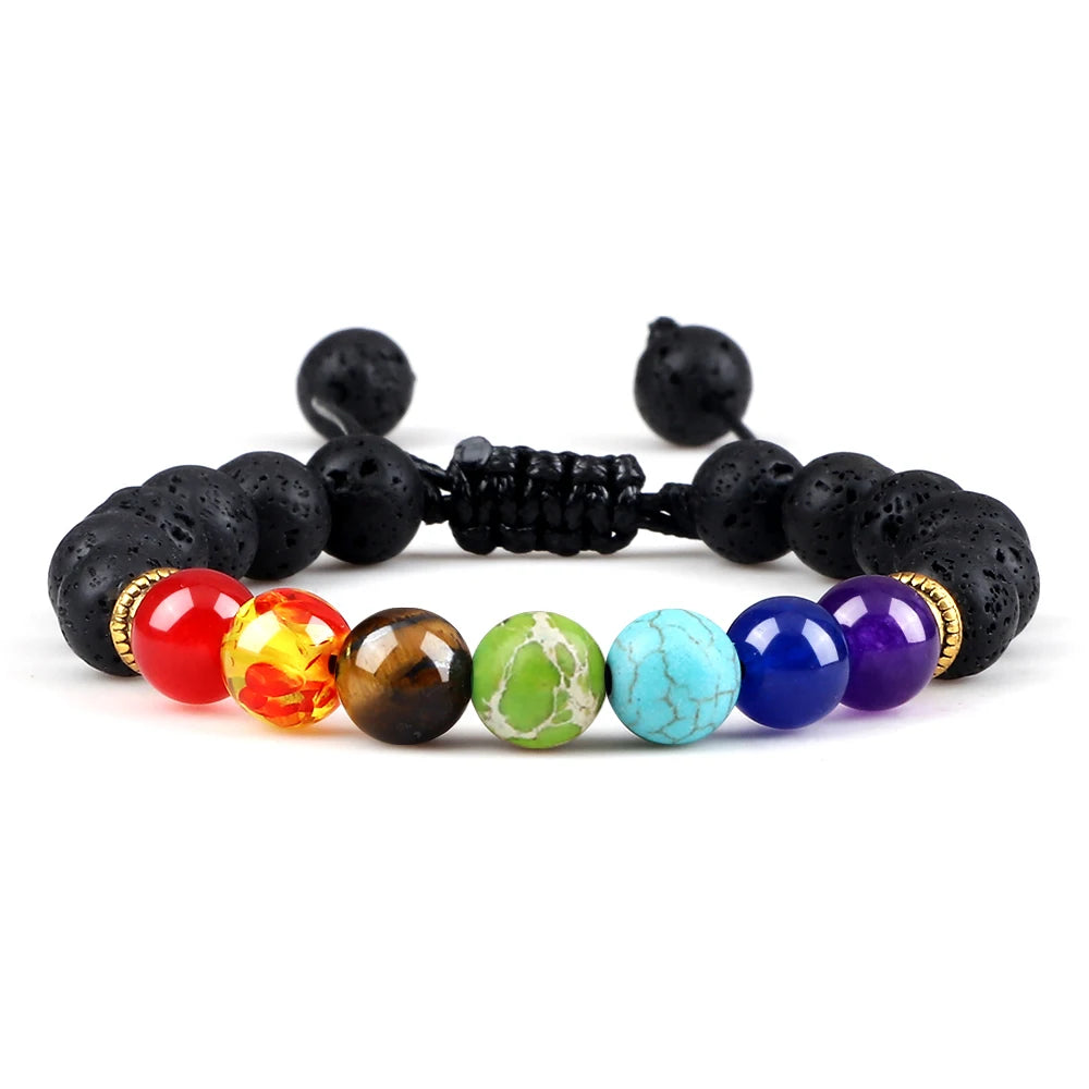 Chakra beaded bracelet with black lava beads and colorful gemstones on a white background
