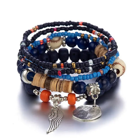 Stack of beaded bracelets with charms on a white background