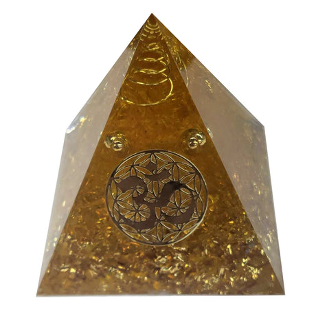 Gold pyramid with Om symbol on a white background