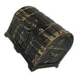 Decorative black and gold barrel-shaped box on a white background