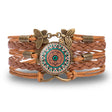 Brown leather bracelet with decorative clasp on a white background