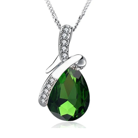 Green teardrop pendant with silver chain on a white background, featuring the brand 'Giemi'.