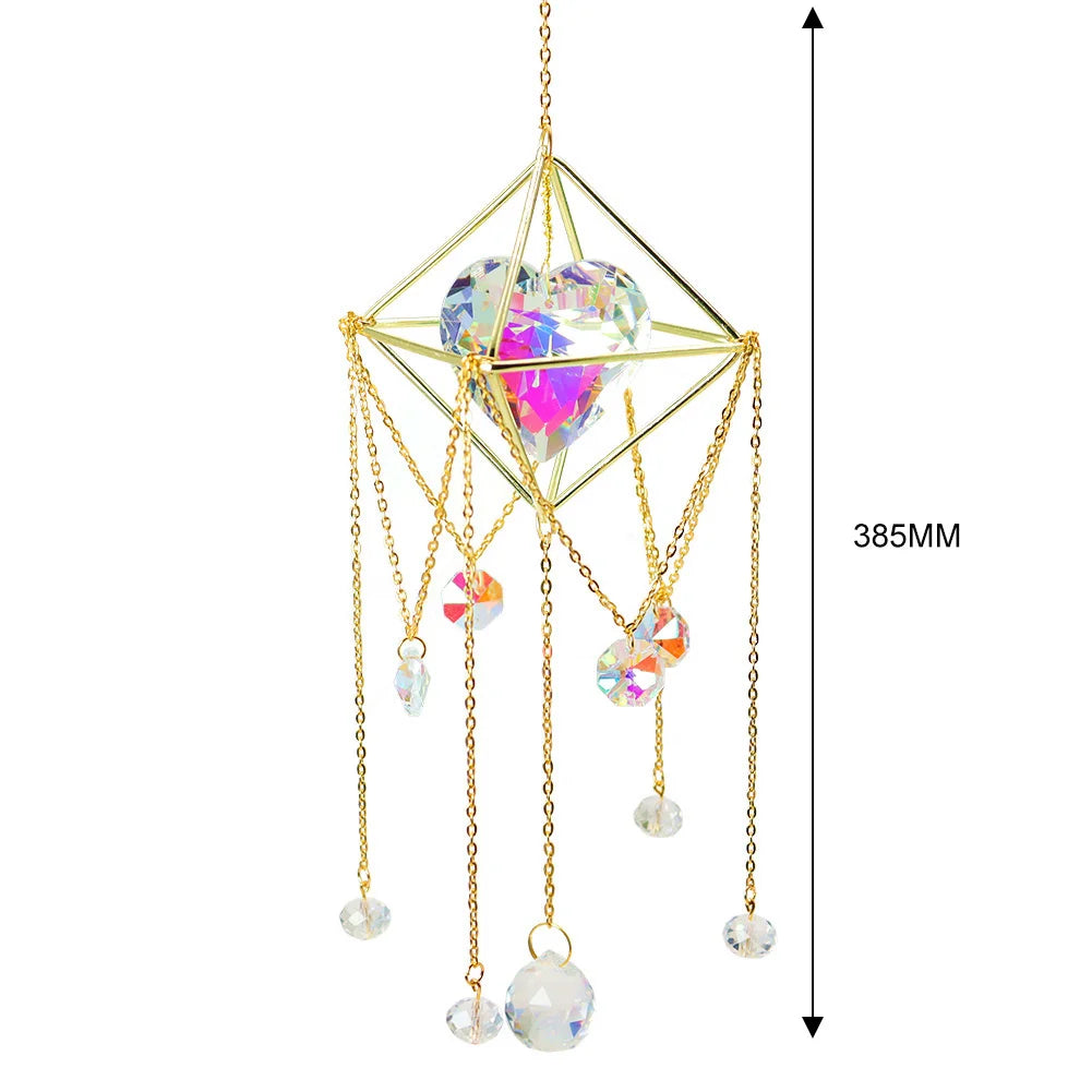 Decorative hanging crystal with gold frame and chains on a white background