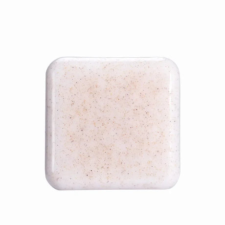 Square ceramic tile with speckled beige pattern on a white background