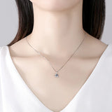 Necklace with a pendant on a mannequin against a neutral background